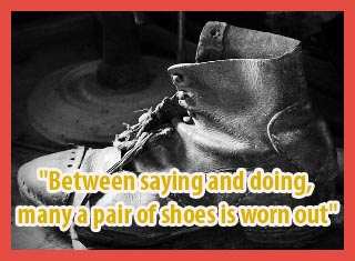 between saying and doing, many a pair of shoes is worn out meaning
